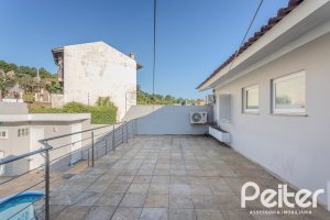 Casa à venda com 265m², 3 dormitórios, 3 suítes, 4 vagas, no bairro Ipanema em Porto Alegre