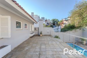 Casa à venda com 265m², 3 dormitórios, 3 suítes, 4 vagas, no bairro Ipanema em Porto Alegre