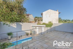 Casa à venda com 265m², 3 dormitórios, 3 suítes, 4 vagas, no bairro Ipanema em Porto Alegre