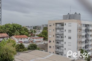 Apartamento à venda com 103m², 3 dormitórios, 1 suíte, 2 vagas, no bairro Cristal em Porto Alegre