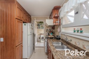 Casa em Condomínio à venda com 182m², 3 dormitórios, 1 suíte, 3 vagas, no bairro Cavalhada em Porto Alegre