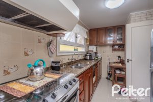 Casa em Condomínio à venda com 182m², 3 dormitórios, 1 suíte, 3 vagas, no bairro Cavalhada em Porto Alegre