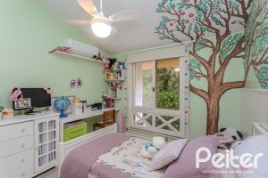 Casa em Condomínio à venda com 182m², 3 dormitórios, 1 suíte, 3 vagas, no bairro Cavalhada em Porto Alegre