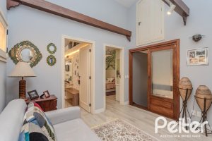 Casa em Condomínio à venda com 182m², 3 dormitórios, 1 suíte, 3 vagas, no bairro Cavalhada em Porto Alegre