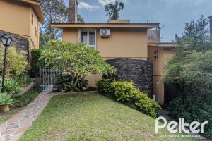 Casa em Condomínio à venda com 182m², 3 dormitórios, 1 suíte, 3 vagas, no bairro Cavalhada em Porto Alegre