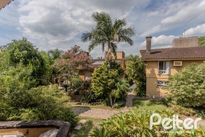 Casa em Condomínio à venda com 182m², 3 dormitórios, 1 suíte, 3 vagas, no bairro Cavalhada em Porto Alegre