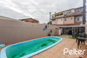 Casa à venda com 182m², 4 dormitórios, 3 suítes, 4 vagas, no bairro Espírito Santo em Porto Alegre