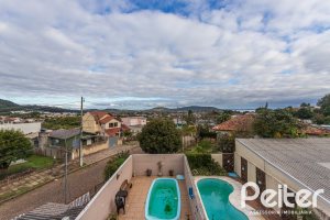 Casa à venda com 182m², 4 dormitórios, 3 suítes, 4 vagas, no bairro Espírito Santo em Porto Alegre