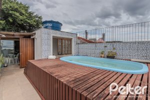 Casa à venda com 212m², 3 dormitórios, 1 suíte, 2 vagas, no bairro Ipanema em Porto Alegre