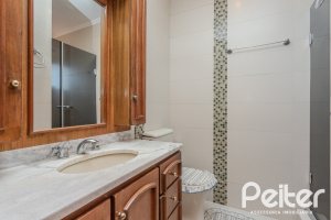 Casa em Condomínio à venda com 175m², 3 dormitórios, 1 suíte, 2 vagas, no bairro Ipanema em PORTO ALEGRE