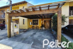 Casa em Condomínio à venda com 96m², 3 dormitórios, 2 vagas, no bairro Hípica em Porto Alegre