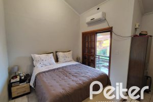 Casa em Condomínio à venda com 96m², 3 dormitórios, 2 vagas, no bairro Hípica em Porto Alegre