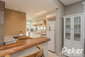 Casa à venda com 150m², 3 dormitórios, 1 suíte, 3 vagas, no bairro Vila Assunção em Porto Alegre