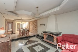Casa à venda com 223m², 3 dormitórios, 1 suíte, 4 vagas, no bairro Jardim Isabel em Porto Alegre