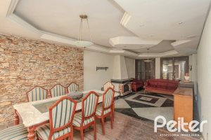 Casa à venda com 223m², 3 dormitórios, 1 suíte, 4 vagas, no bairro Jardim Isabel em Porto Alegre