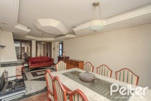 Casa à venda com 223m², 3 dormitórios, 1 suíte, 4 vagas, no bairro Jardim Isabel em Porto Alegre