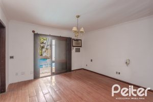 Casa à venda com 223m², 3 dormitórios, 1 suíte, 4 vagas, no bairro Jardim Isabel em Porto Alegre
