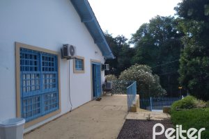 Casa à venda com 117m², 2 dormitórios, 2 vagas, no bairro Tristeza em Porto Alegre