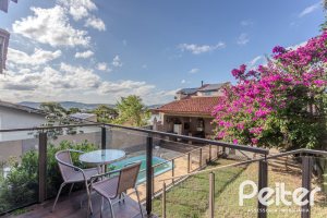Casa à venda com 227m², 3 dormitórios, 3 suítes, 2 vagas, no bairro Espírito Santo em Porto Alegre