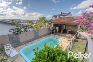 Casa à venda com 227m², 3 dormitórios, 3 suítes, 2 vagas, no bairro Espírito Santo em Porto Alegre