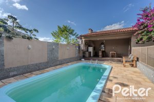 Casa à venda com 227m², 3 dormitórios, 3 suítes, 2 vagas, no bairro Espírito Santo em Porto Alegre