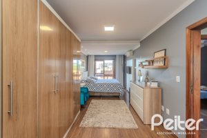 Casa à venda com 227m², 3 dormitórios, 3 suítes, 2 vagas, no bairro Espírito Santo em Porto Alegre