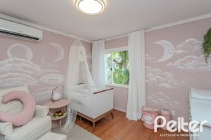 Casa em Condomínio à venda com 189m², 3 dormitórios, 1 suíte, 2 vagas, no bairro Jardim Isabel em Porto Alegre