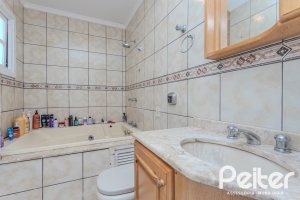 Casa em Condomínio à venda com 189m², 3 dormitórios, 1 suíte, 2 vagas, no bairro Jardim Isabel em Porto Alegre