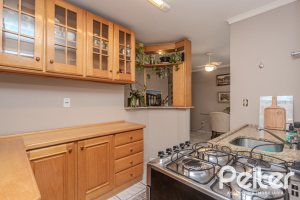 Casa em Condomínio à venda com 189m², 3 dormitórios, 1 suíte, 2 vagas, no bairro Jardim Isabel em Porto Alegre