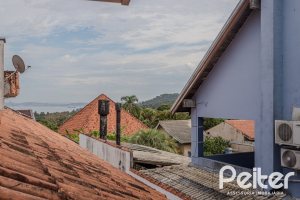 Casa em Condomínio à venda com 189m², 3 dormitórios, 1 suíte, 2 vagas, no bairro Jardim Isabel em Porto Alegre