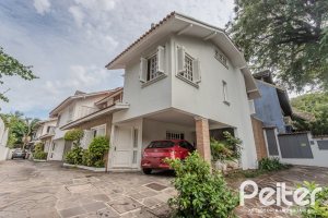 Casa em Condomínio à venda com 189m², 3 dormitórios, 1 suíte, 2 vagas, no bairro Jardim Isabel em Porto Alegre