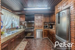 Casa à venda com 800m², 5 dormitórios, 2 suítes, 5 vagas, no bairro Jardim Isabel em Porto Alegre