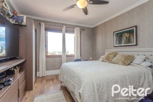 Casa em Condomínio à venda com 404m², 3 dormitórios, 1 suíte, 2 vagas, no bairro Cristal em PORTO ALEGRE