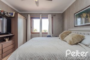 Casa em Condomínio à venda com 404m², 3 dormitórios, 1 suíte, 2 vagas, no bairro Cristal em PORTO ALEGRE