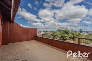 Casa em Condomínio à venda com 404m², 3 dormitórios, 1 suíte, 2 vagas, no bairro Cristal em PORTO ALEGRE