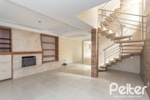 Casa à venda com 237m², 3 dormitórios, 3 suítes, 2 vagas, no bairro Tristeza em Porto Alegre