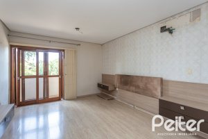 Casa à venda com 237m², 3 dormitórios, 3 suítes, 2 vagas, no bairro Tristeza em Porto Alegre