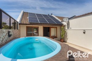 Casa à venda com 237m², 3 dormitórios, 3 suítes, 2 vagas, no bairro Tristeza em Porto Alegre