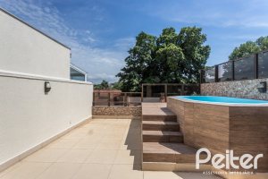 Casa à venda com 237m², 3 dormitórios, 3 suítes, 2 vagas, no bairro Tristeza em Porto Alegre