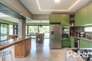 Casa em Condomínio à venda com 300m², 3 dormitórios, 3 suítes, 4 vagas, no bairro Alphaville em PORTO ALEGRE