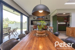 Casa em Condomínio à venda com 300m², 3 dormitórios, 3 suítes, 4 vagas, no bairro Alphaville em PORTO ALEGRE