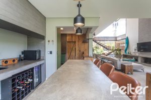 Casa em Condomínio à venda com 300m², 3 dormitórios, 3 suítes, 4 vagas, no bairro Alphaville em PORTO ALEGRE