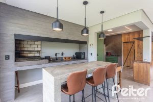 Casa em Condomínio à venda com 300m², 3 dormitórios, 3 suítes, 4 vagas, no bairro Alphaville em PORTO ALEGRE