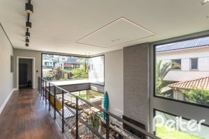 Casa em Condomínio à venda com 300m², 3 dormitórios, 3 suítes, 4 vagas, no bairro Alphaville em PORTO ALEGRE