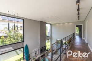 Casa em Condomínio à venda com 300m², 3 dormitórios, 3 suítes, 4 vagas, no bairro Alphaville em PORTO ALEGRE