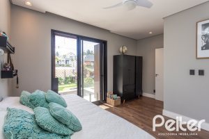 Casa em Condomínio à venda com 300m², 3 dormitórios, 3 suítes, 4 vagas, no bairro Alphaville em PORTO ALEGRE