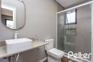 Casa em Condomínio à venda com 300m², 3 dormitórios, 3 suítes, 4 vagas, no bairro Alphaville em PORTO ALEGRE