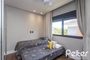 Casa em Condomínio à venda com 300m², 3 dormitórios, 3 suítes, 4 vagas, no bairro Alphaville em PORTO ALEGRE