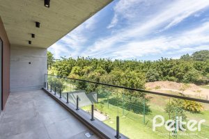 Casa em Condomínio à venda com 300m², 3 dormitórios, 3 suítes, 4 vagas, no bairro Alphaville em PORTO ALEGRE