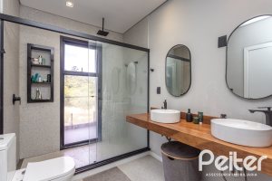 Casa em Condomínio à venda com 300m², 3 dormitórios, 3 suítes, 4 vagas, no bairro Alphaville em PORTO ALEGRE